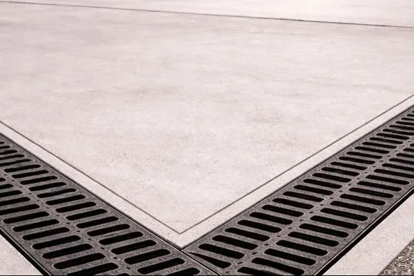 Trench drain installed along a gas station fueling area